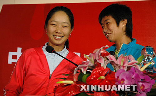 中国第一枚奥运网球女子双打金牌获得者李婷、